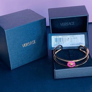 Versace Gold Bracelet with Medussa Surrounded by Pink Stones. Expandable